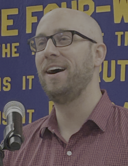 man in front of microphone