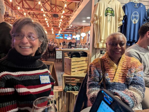 Two women smiling.