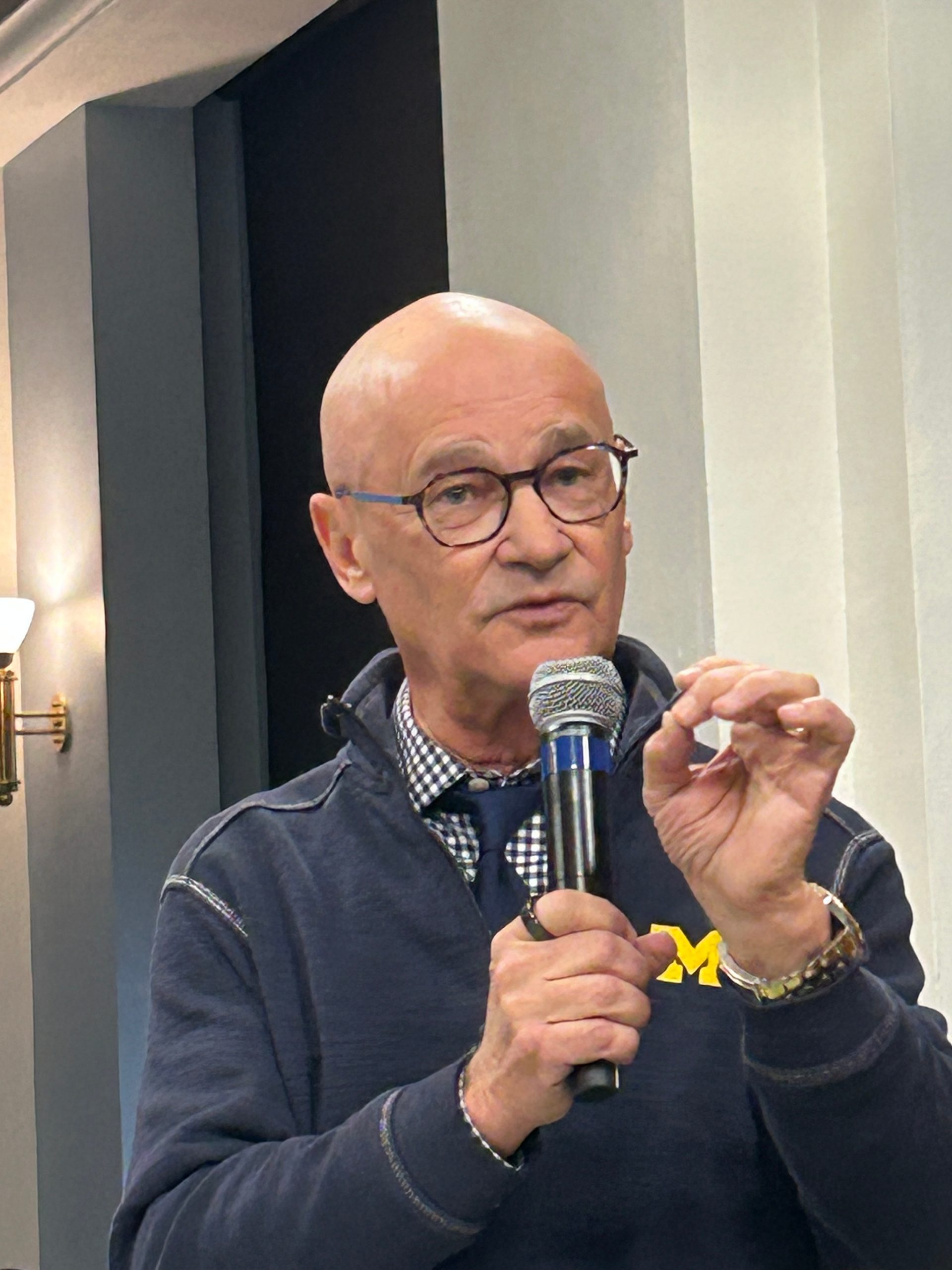Man speaking into microphone.