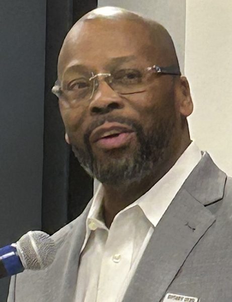 Man speaking into microphone.